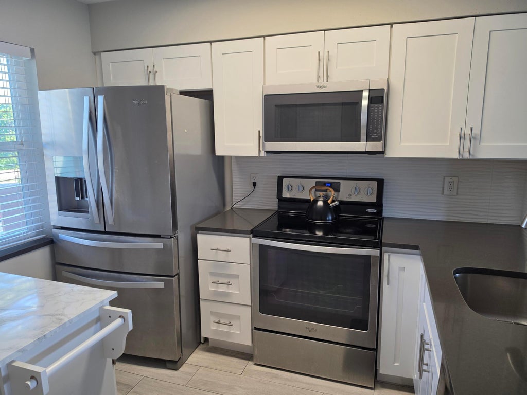 Photo of 2106 S Cypress Bend Drive #510, Pompano Beach, FL 33069 (MLS # B26050049)