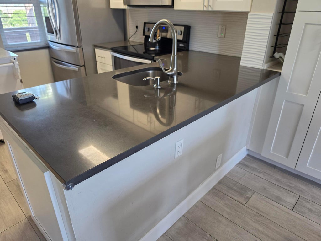 Photo of 2106 S Cypress Bend Drive #510, Pompano Beach, FL 33069 (MLS # B26050049)