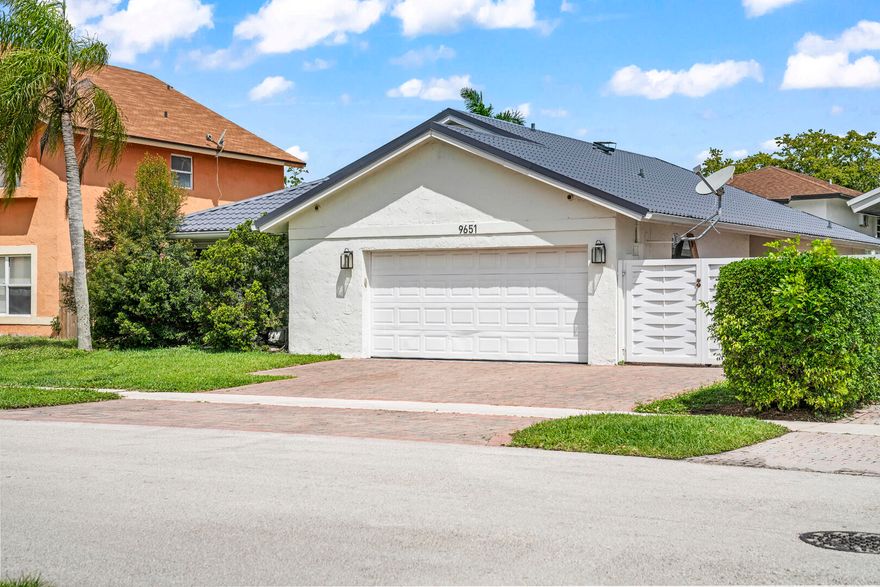 Built in 1989, 3/2 single family detached house in quiet community featuring open living space, cathedral ceiling, impact rated doors and windows, private chlorinated swimming pool with heater, new metal roof (permitted and installed in 2024), newer A/C (installed in 2021) serviced yearly, low semi-annual ($250) HOA fees, 2 car garage, screened in patio, private and paved sitting area by pool, newly paved and sealed driveway, new aluminum privacy fence, new LVP throughout, Xfinity cable and internet, newer appliances, wine cellar.  Located south of Pines on 96 Avenue. Close to all necessities. Owner to stay in house until late June. Purchase/sale does not need HOA approval. Showing is by appointment only.  Kindly call listing agent 24 hours prior to desired viewing.