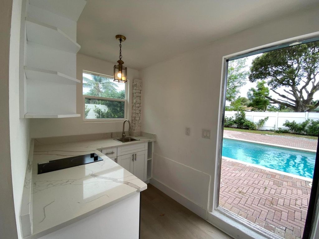 Photo of 330 Cypress Drive #C, Lake Park, FL 33403 (MLS # R11033680)