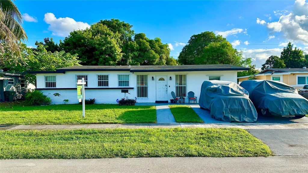 Photo of 4810 NW 11th Pl, Lauderhill, FL 33313 (MLS # F10532160)