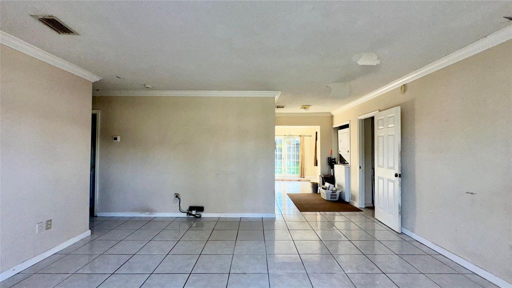 Photo of 4810 NW 11th Pl, Lauderhill, FL 33313 (MLS # F10532160)
