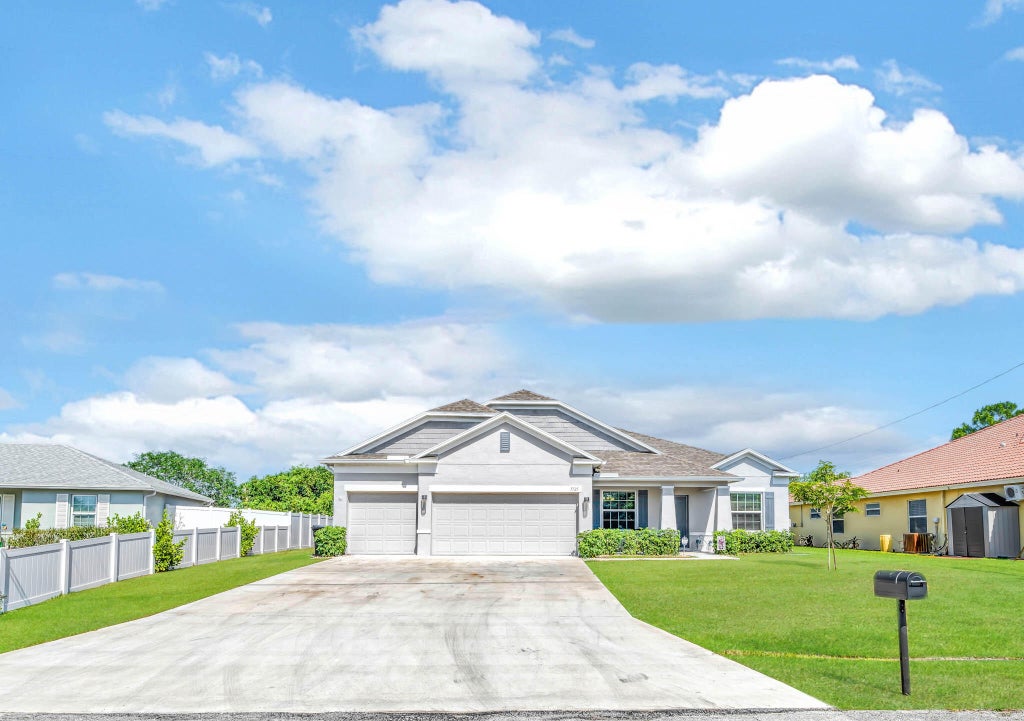 Photo of 3725 SW Jack Street, Port Saint Lucie, FL 34953 (MLS # R10979255)