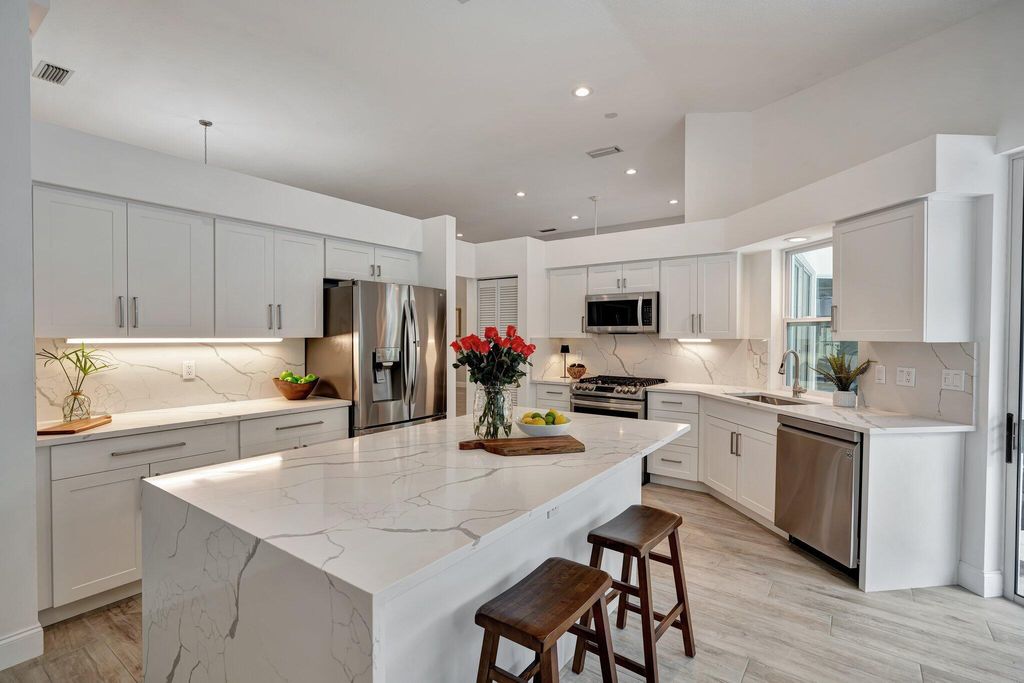 Photo of 201 Eagleton Estates Boulevard, Palm Beach Gardens, FL 33418 (MLS # R10981652)