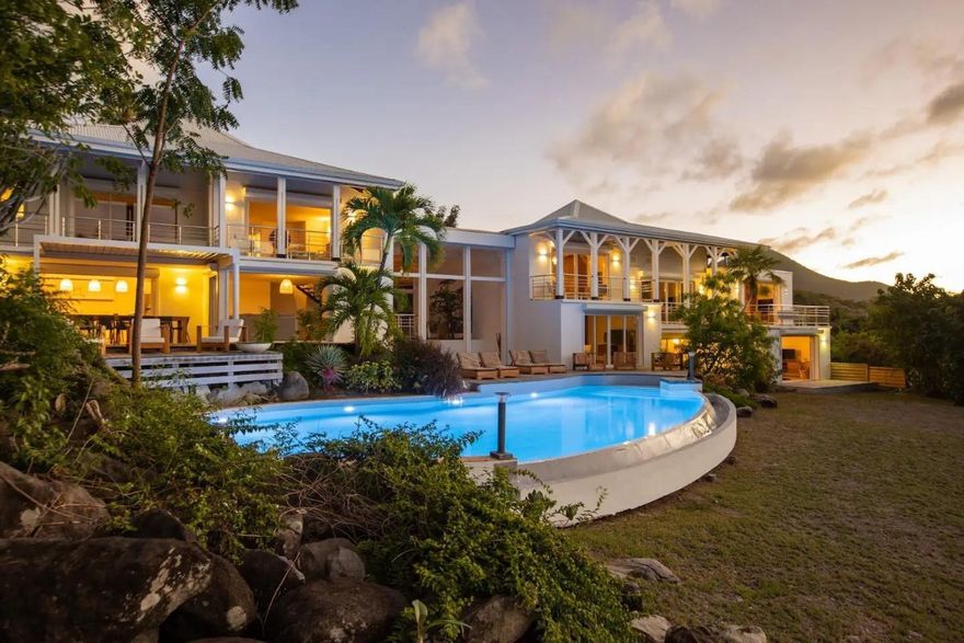 Discover this exceptional contemporary villa offering stunning ocean views and ultimate comfort. With 7 spacious bedrooms and 7 elegant bathrooms, it’s perfect for hosting family and guests in refined luxury.Enjoy a large infinity pool, bright living areas with high ceilings, and a fully equipped gourmet kitchen with wine/rum cellar and pantry. Every detail is new, modern, and tastefully designed.A separate caretaker’s villa with its own bedroom, kitchen, and bathroom ensures privacy and convenience for staff or guests. Set in a peaceful location just minutes from the marina, shops, and restaurants, this villa offers the perfect mix of serenity and accessibility. Sail easily to Saint Barts, Anguilla, and beyond from your private paradise.