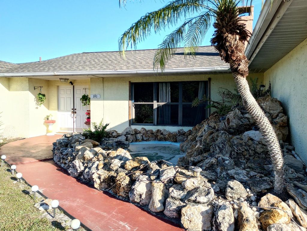 Photo of 191 SW Thanksgiving Avenue, Port Saint Lucie, FL 34984 (MLS # R10953547)