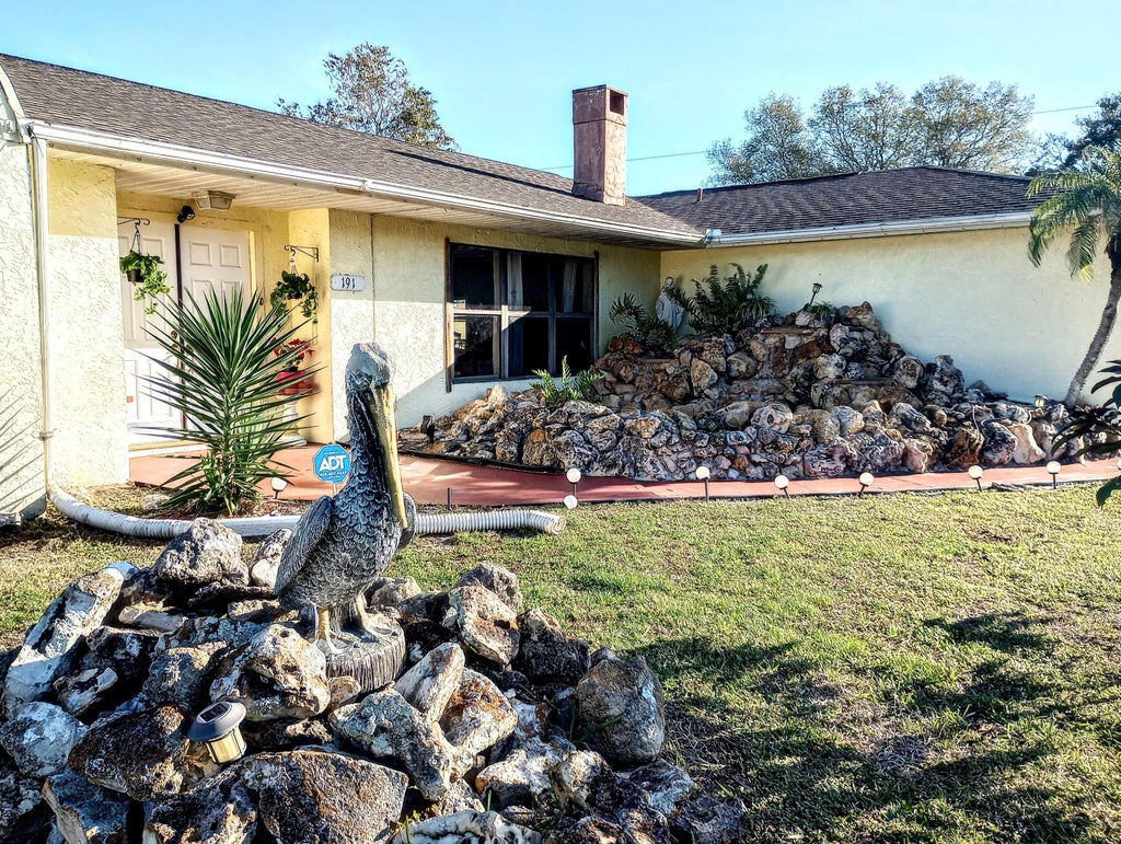 Photo of 191 SW Thanksgiving Avenue, Port Saint Lucie, FL 34984 (MLS # R10953547)