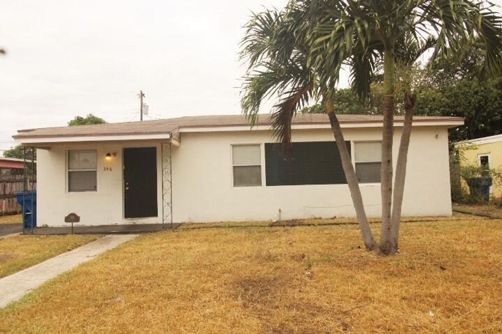Photo of 346 W 15th Street, Riviera Beach, FL 33404 (MLS # R11039233)