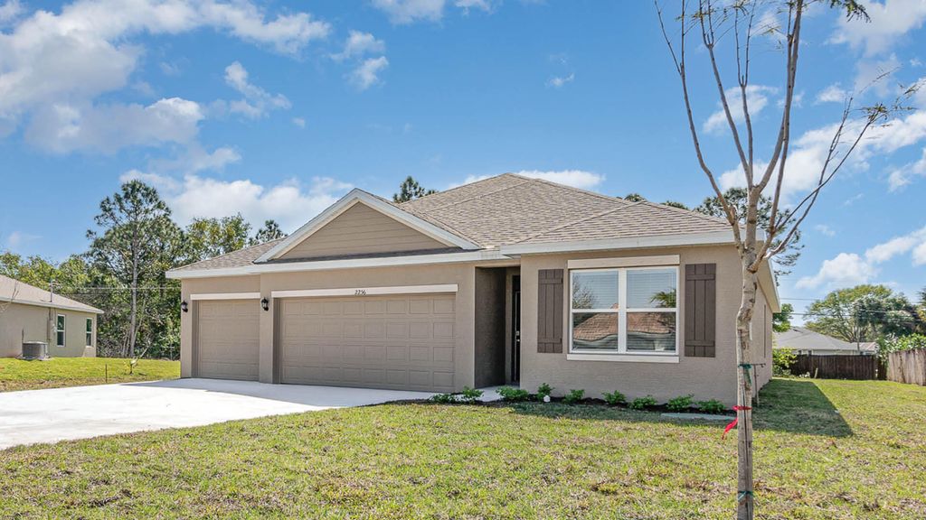 Photo of 5103 NW Rugby Drive, Port Saint Lucie, FL 34983 (MLS # R10952653)