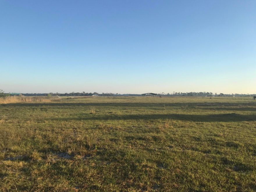 This stunning property boasts an expansive 75 acres with a main home, guest house, metal shop, stables, and another smaller livestock barn. This property is quiet with gorgeous views over looking a private lake. This is a one of a kind property that offers everything you could want in a home or weekend retreat. There are custom barn wood floors, a wrap around porch for lazy afternoons,  a custom kitchen, tons of natural light, and room for all of your friends and family. Perfect for atvs, horses, or livestock. This property can go any direction you choose! Call today!