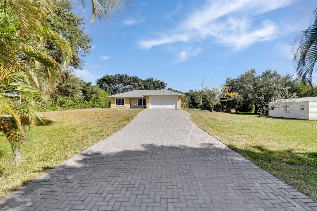 Photo of 16592 74th Avenue N, Palm Beach Gardens, FL 33418 (MLS # R11043458)