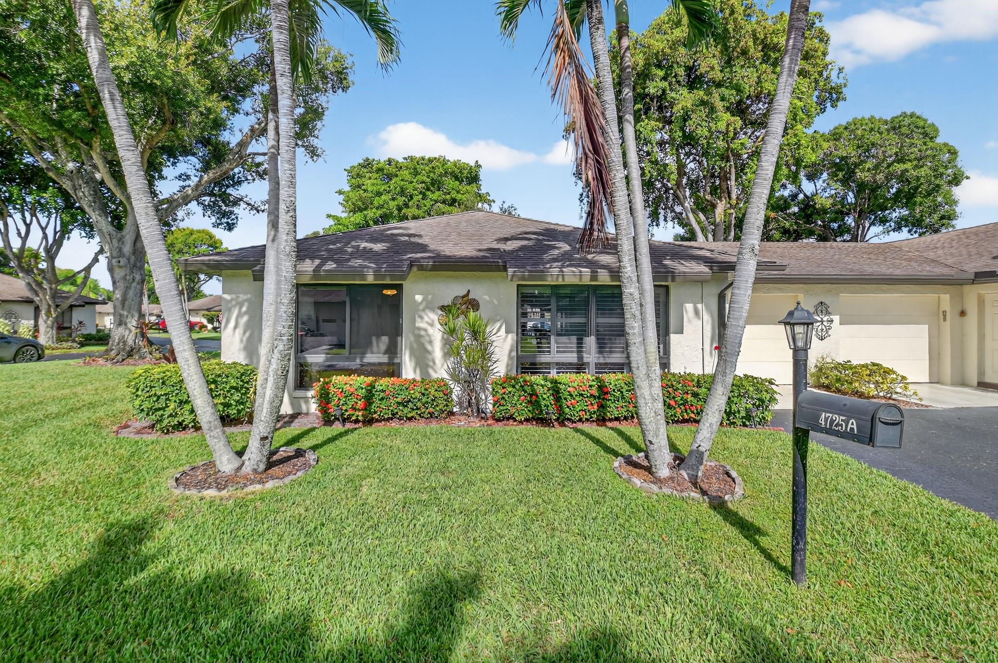 Beautiful move-in ready villa featuring wood-look tile throughout main living areas. The updated kitchen boasts
granite counters, a large island, and two spacious pantries. Renovated bathrooms, plantation shutters, hurricane
impact windows, and a newer AC (2022) offer comfort and style. Stacked washer/dryer in the garage with attic
insulation and a new pull-down ladder. Enjoy the screened lanai with Italian tile leading to your outside patio. The
community features 6 pools, 6 clubhouses, and the HOA includes exterior maintenance, roof care, building
insurance, lawn care, water, basic cable, and internet. Located less than 15 minutes from the beach, shopping,
dining, and vibrant Atlantic Avenue. South Florida living at its best, don't miss this one!
