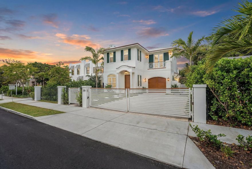 New co-ownership opportunity by Pacaso: Own one-eighth of Palma Verde, a professionally managed turnkey home in West Palm Beach's coveted Southend neighborhood, just minutes from the waterfront, beaches, Worth Avenue shopping, and the dining and culture of downtown Palm Beach. Built with all-concrete construction, this 3,647-square-foot residence offers 4 bedrooms and 4.5 baths. Interior features include 10-foot ceilings, arched doorways, a gas fireplace, and a chef's kitchen with premium finishes that opens to spacious living and dining areas. Bifold doors create seamless indoor-outdoor living, leading to a private backyard with a heated saltwater pool, spa, outdoor kitchen, steam room, and outdoor shower. Upstairs, a large balcony overlooks the lush grounds.  Additional highlights include a whole-home indoor/outdoor sound system, LED security cameras, a garage, and a four-car driveway. Home comes fully furnished and professionally designed.