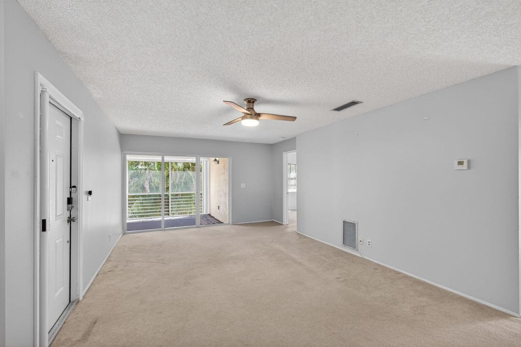 Photo of 12416 Fl A1aalt, Palm Beach Gardens, FL 33410 (MLS # B26019352)