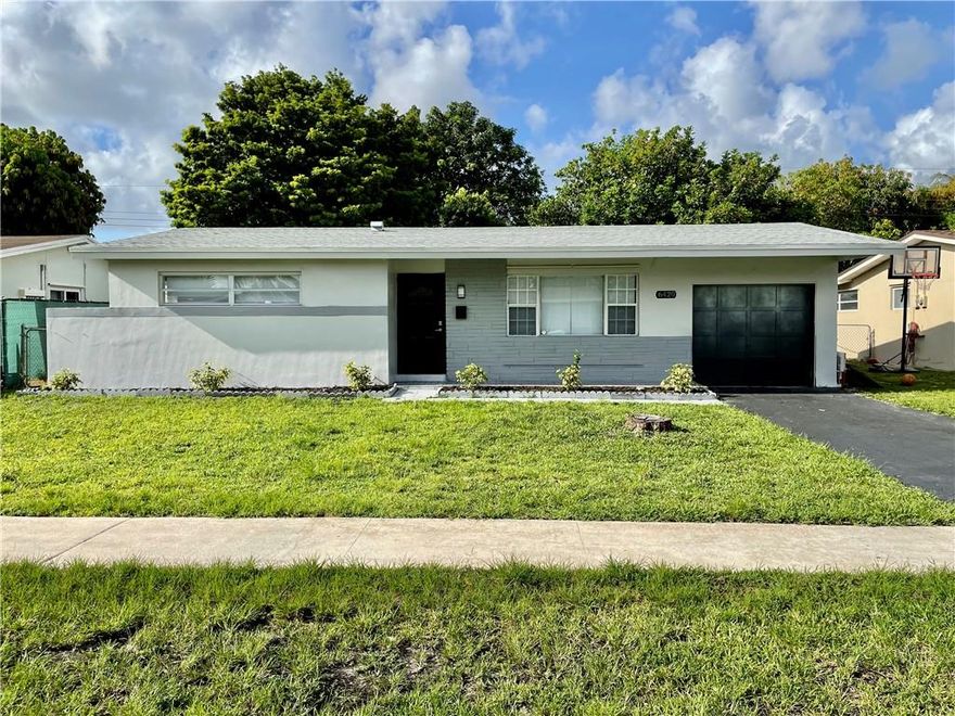This totally remodeled one story home in Sunrise Golf features a great floorplan. Step into the bright living & dining room area that leads to a brand new kitchen with wood cabinets, stainless steel appliances, garbage disposal, quartz countertops & subway tile backsplash. Huge family room (can be converted into a 3rd bedroom & bath) overlooks a nice sized private backyard with exotic fruit trees & enclosed patio. Plenty of room for a pool. Great for family gatherings. Freshly painted in & out. Laminate floors throughout. Brand new roof with warranty and new gas water heater. Newer A/C. Lots of natural light.  Plumbing and electric up to code. Washer & Dryer hookup in garage. No HOA's.  Park your RV/boat in your long driveway. Great curb appeal. Close to major highways & Sawgrass Mall.