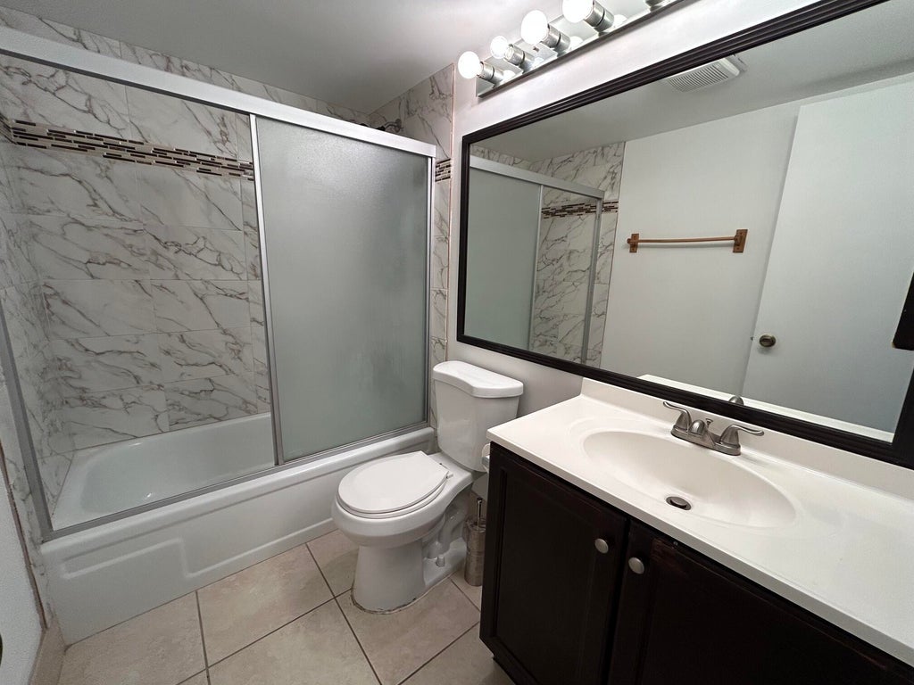 Photo of 22 Dorset A #22, Boca Raton, FL 33434 (MLS # B26078062)