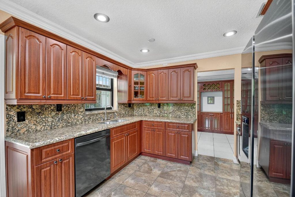 Photo of 1035 Soelca Drive, West Palm Beach, FL 33405 (MLS # R11118790)