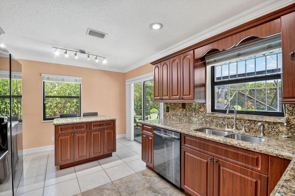Photo of 1035 Soelca Drive, West Palm Beach, FL 33405 (MLS # R11118790)