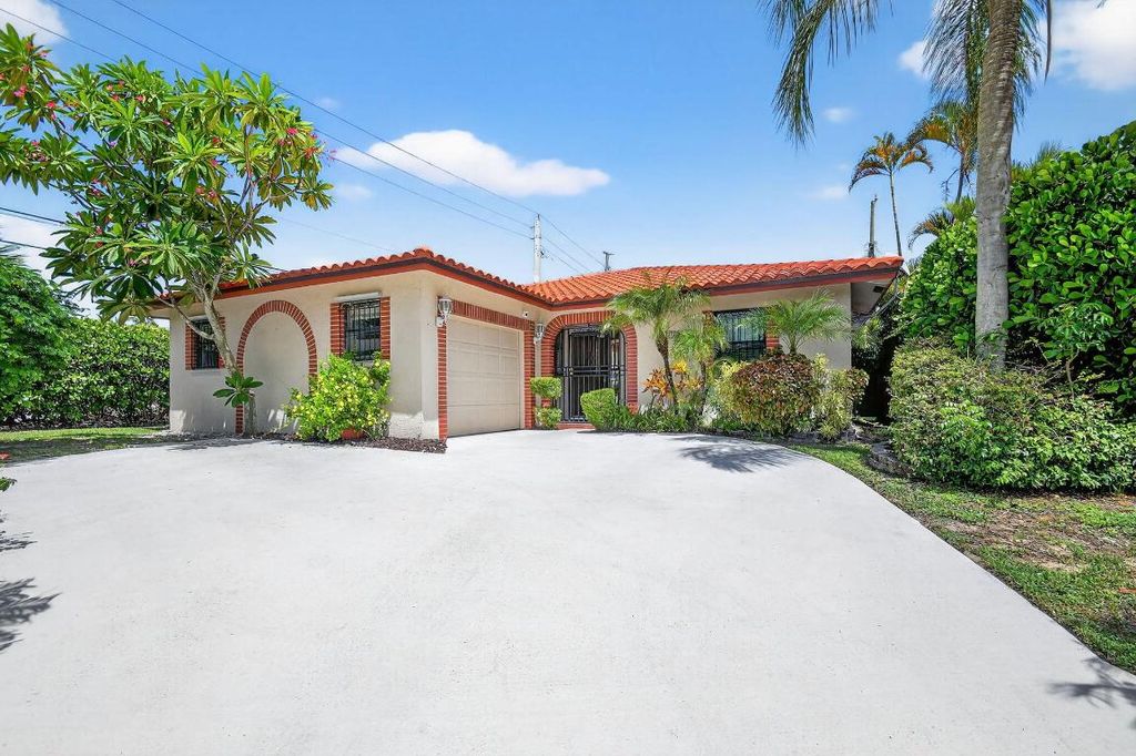 Photo of 1035 Soelca Drive, West Palm Beach, FL 33405 (MLS # R11118790)