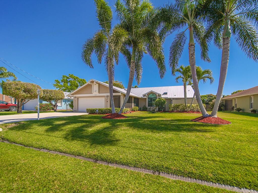 Photo of 2489 SE Hallahan Street, Port Saint Lucie, FL 34952 (MLS # R10962081)