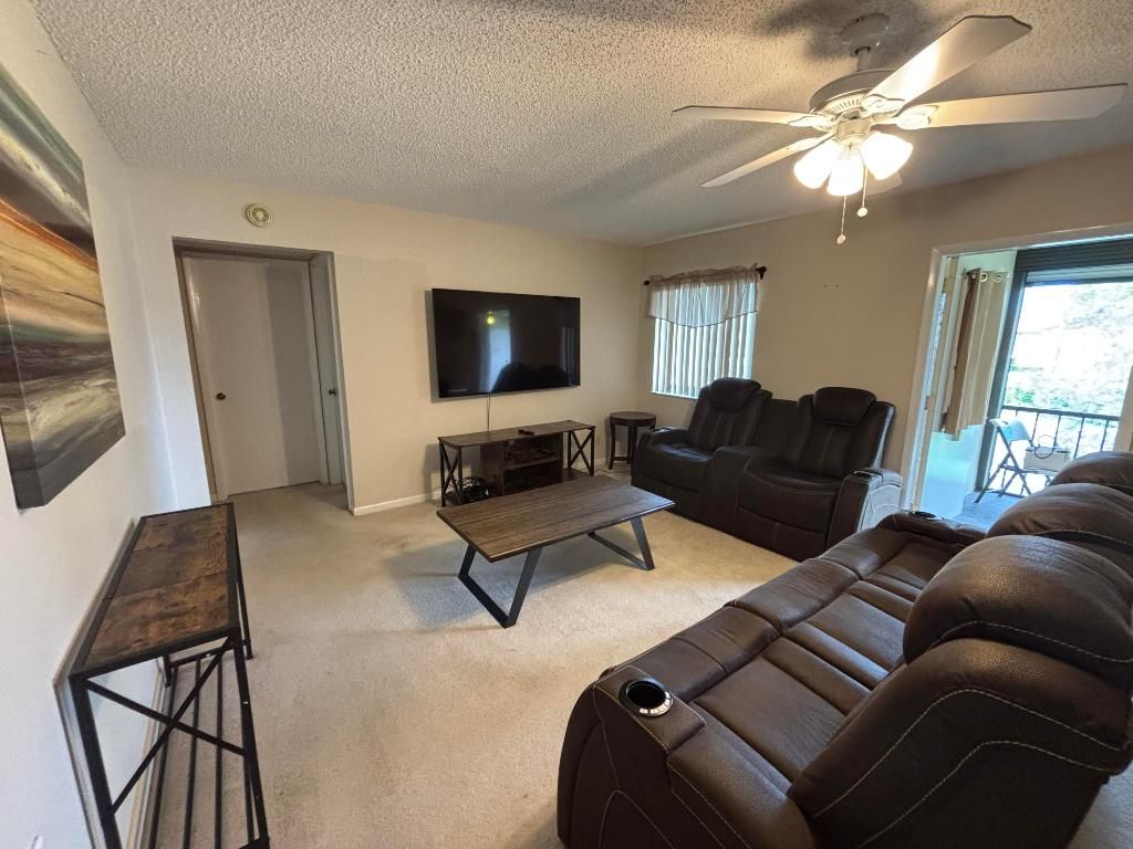 Photo of 335 Knotty Pine Circle #D2, Greenacres, FL 33463 (MLS # R11101138)