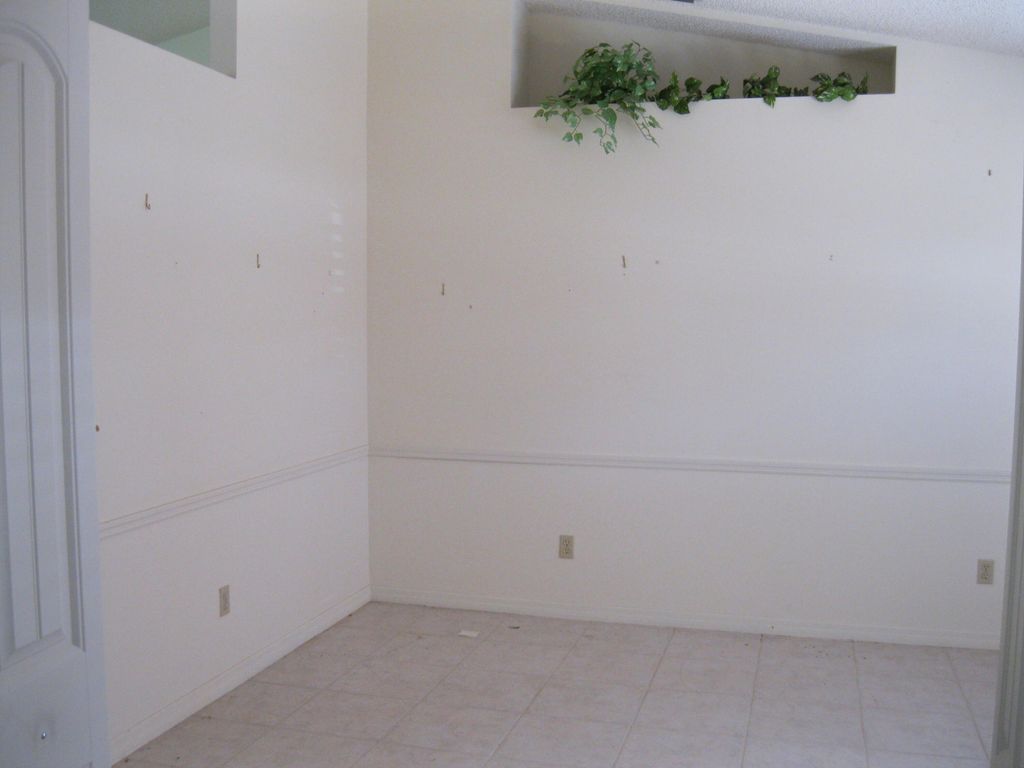 Photo of 2291 SW Jay Avenue, Port Saint Lucie, FL 34953 (MLS # B26020896)