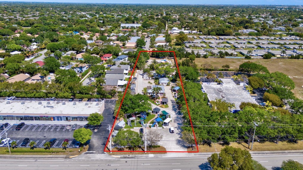 Photo of 4013 W Atlantic Avenue, Delray Beach, FL 33445 (MLS # B26058766)