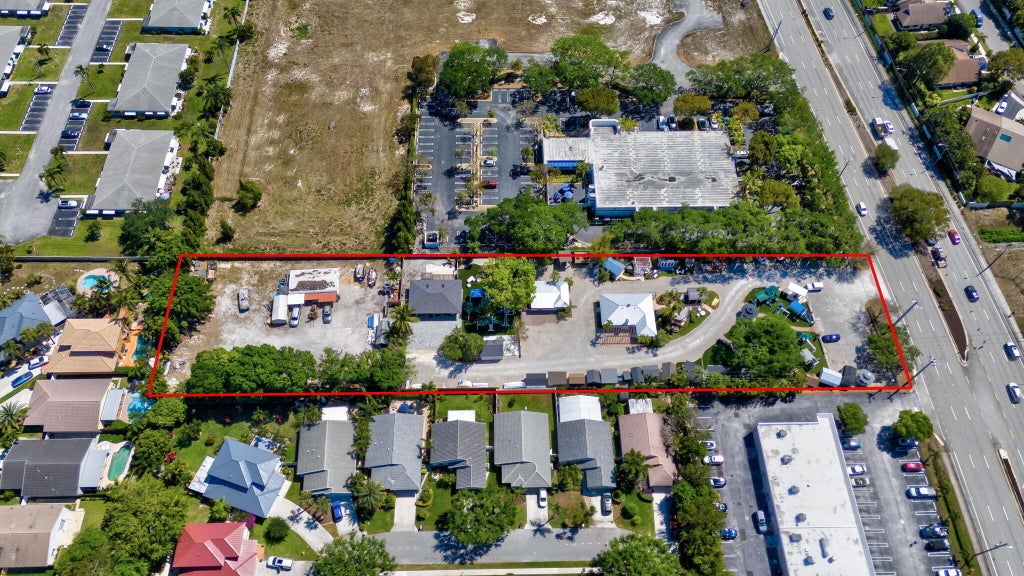 Photo of 4013 W Atlantic Avenue, Delray Beach, FL 33445 (MLS # B26058766)
