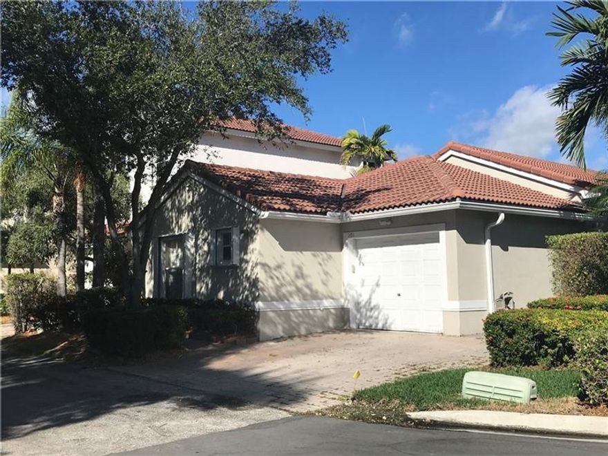 VERY RARE 1 STORY 3/2 CORNER HOME WITH 1 CAR GARAGE.  REMODELED WITH OPEN KITCHEN WITH QUARTZ COUNTER TOPS, STAINLESS STEEL APPLIANCES, AND WOOD CABINETS.  WOOD FLOORS THROUGHOUT.  HIGH CEILINGS.  LARGE MASTER BEDROOM WITH WALK IN CLOSET AND LARGE MASTER BATH.  AMAZING PATIO AREA WITH ACCESS FROM THE LIVING ROOM AND MASTER BEDROOM.  TONS OF NATURAL LIGHT WITH EXTRA WINDOWS BEING A CORNER.  PLANTATION SHUTTERS THROUGHOUT THE HOUSE.  HURRICANE ACCORDION SHUTTERS.  WEST LAKE IS GUARD GATED 24/7 AND LOCATED JUST 1 MILE FROM THE OCEAN.  AMENITIES INCLUDE SWIMMING POOL, TENNIS, BASKETBALL, EXERCISE ROOM, CLUBHOUSE, AND KIDS PLAY AREA.