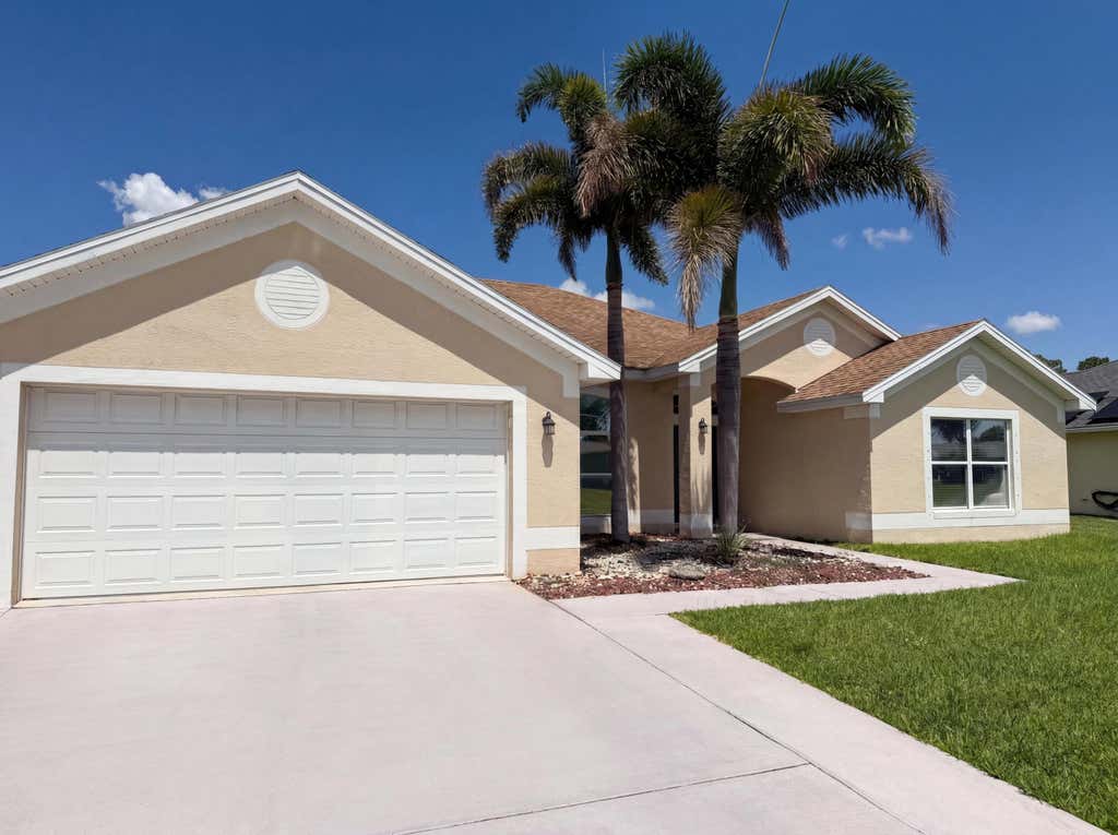 Photo of 3642 SW Sterricker Street, Port Saint Lucie, FL 34953 (MLS # B26049743)