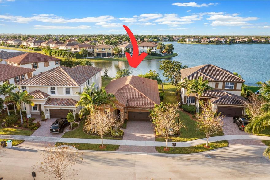 4 Bed + 3 Bath Waterfront Carlyle Model Home Sits On A Cul-De-Sac In One Of Most Sought After Communities In Parkland. Impact Windows & Doors, Full House Generator, Split Floor Plan, 4th Bed Has Own On-Suite Bath Perfect For Guests, In-Laws Or Oldest Child. This Home Boasts A Large Open Waterfront Lot w/Extended Pavered Patio w/Lots of Space To Build A Pool & To Take In Sunsets. Entertain The Family In Separate Living & Dining Room w/Custom Light Fixtures Throughout. Kitchen Features White Cabinets & Black Granite Counters w/Eat-In Kitchen & SS Appliances. Tile Floors Throughout The Living Area & Carpets In Beds. Primary Bedroom Overlooks Back Patio & Lake, 2 Walk-In Closets, Separate Tub & Shower. Resort Style Amenities of Both MiraLago & Cascata Communities. Close To A-Rated Schools.