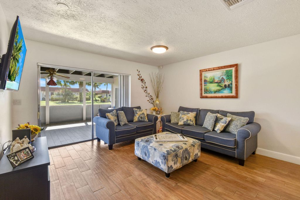 Photo of 5800 W Fernley Dr Dr W #64, Greenacres, FL 33415 (MLS # B26021057)