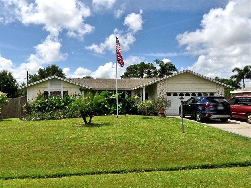 3/2/2 home in need of rehab. Needs roof repair, flooring, kitchen, appliances, paint and has un-permitted addition. Cash buyers only.