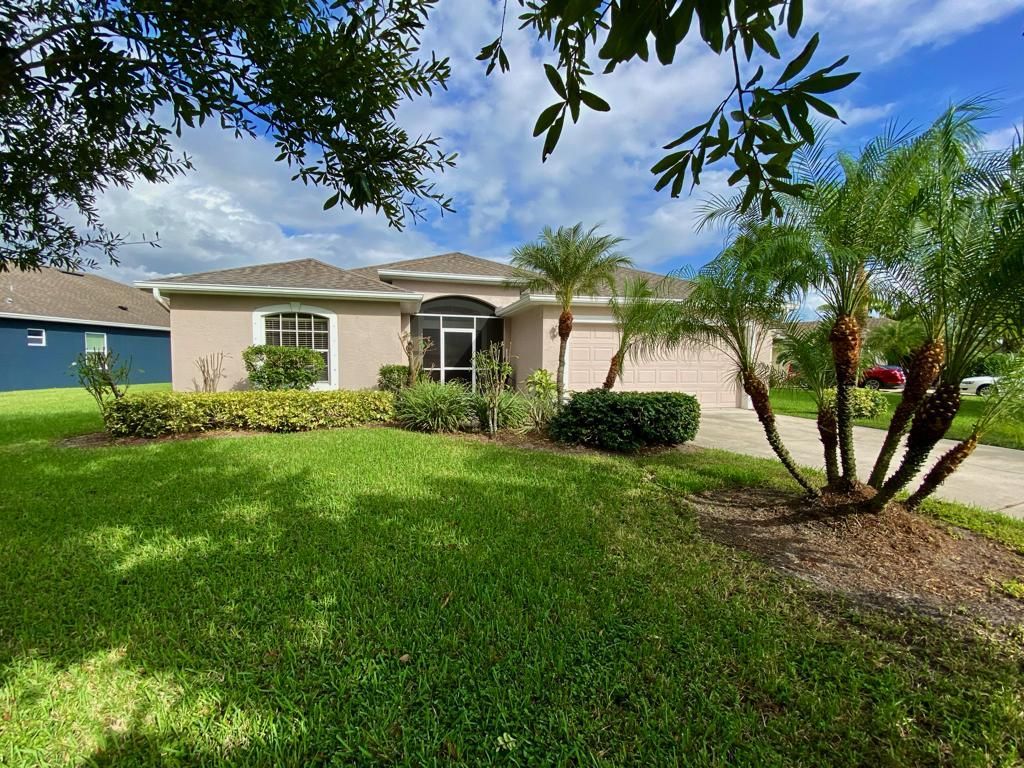 Photo of 2295 NW Tulip Way, Jensen Beach, FL 34957 (MLS # R10762845)