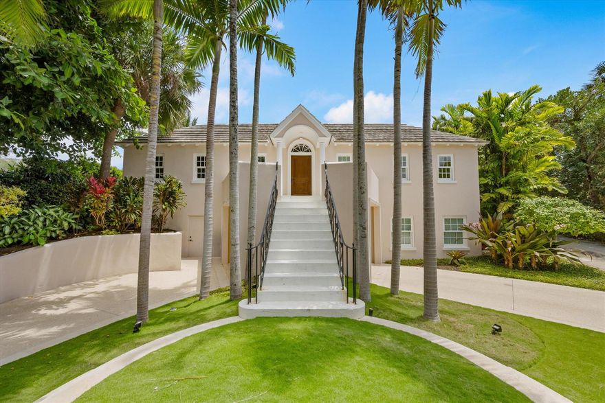 Experience the best of Palm Beach living in this elegant and inviting home, ideally located in the prestigious Estate Section just a short stroll from the beach and the heart of town. Surrounded by grand estates, this charming residence blends luxury, privacy, and comfort, featuring a formal living room with a cozy fireplace and French doors that open to a spacious, covered loggia--perfect for year-round entertaining. Outside, a private oasis awaits with a heated swimming pool, lush landscaping, and a generous backyard designed for relaxation and outdoor enjoyment. A separate guest cottage provides added comfort and privacy for hosting family and friends, making this home a perfect retreat or a sophisticated venue for entertaining.
