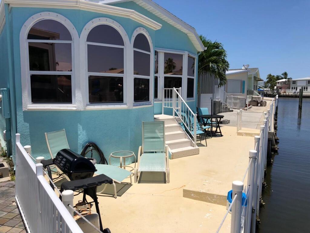 AVAILABLE FOR 2024 and 2025 SEASON! Waterfront vacation rental available in Jensen Beach unique, gated Venture 3 community. Enjoy private beach access, heated pool, boat ramp with slips available for guests, tennis, pickle ball, basketball, bocci and shuffleboard, volleyball, billiards, and gated RV/Boat/Trailer storage and golf cart rental. Winter activities include dances, community dinners and a yearly flea market drawing a crowd from all over the treasure coast.