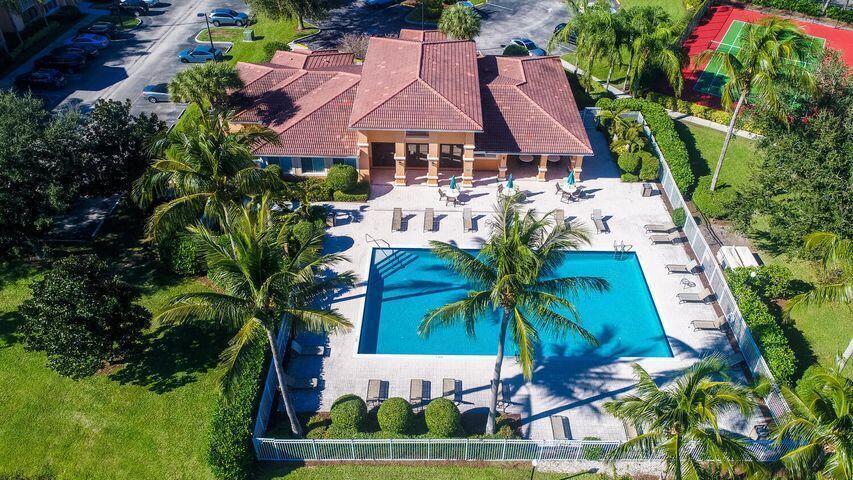 New roof 2025, laminated floors all throughout, New kitchen appliances, perfectly located on the corner of the building which gives it more space and a great Golf club view.This house is ideally located in the heart of Port St. Lucie, in the highly desirable St. Lucie West area. You'll find hospitals, supermarkets, restaurants, banks, and everything you need for a comfortable lifestyle.''