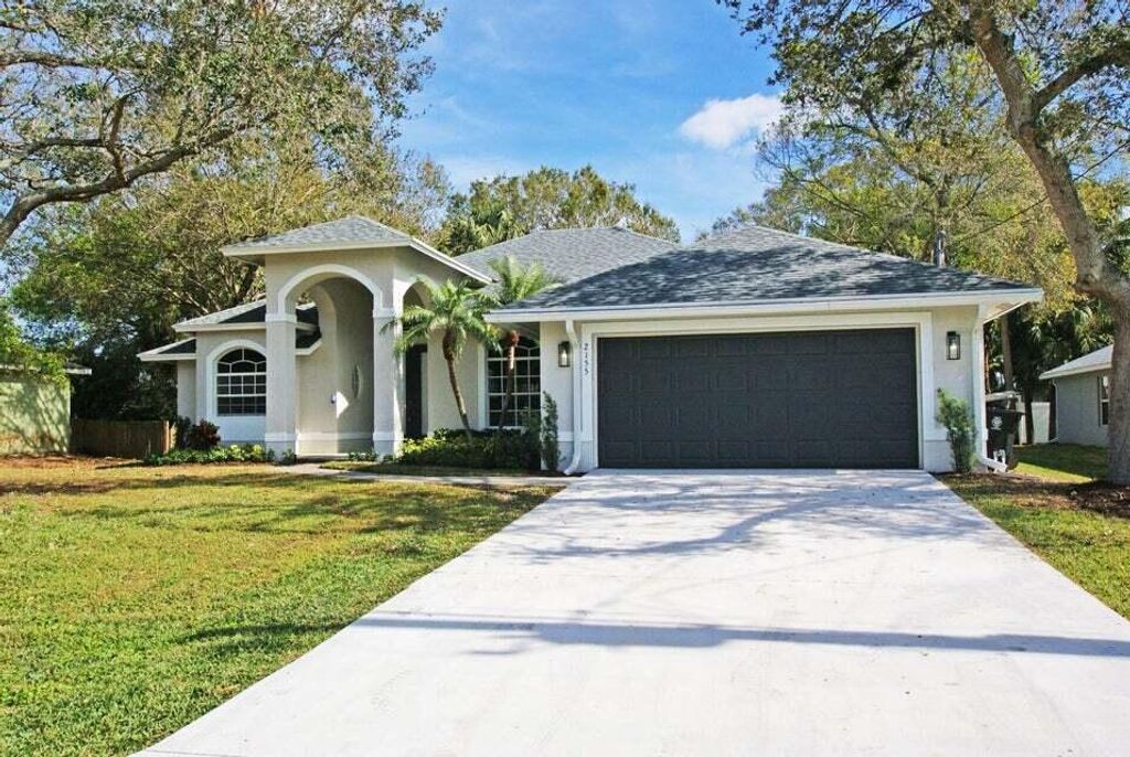 Photo of 2155 SW Madruga Street, Port Saint Lucie, FL 34953 (MLS # R10944047)