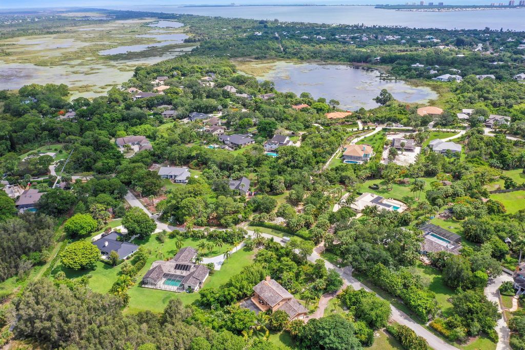 Photo of 880 NE Stokes Terrace, Jensen Beach, FL 34957 (MLS # R11094580)