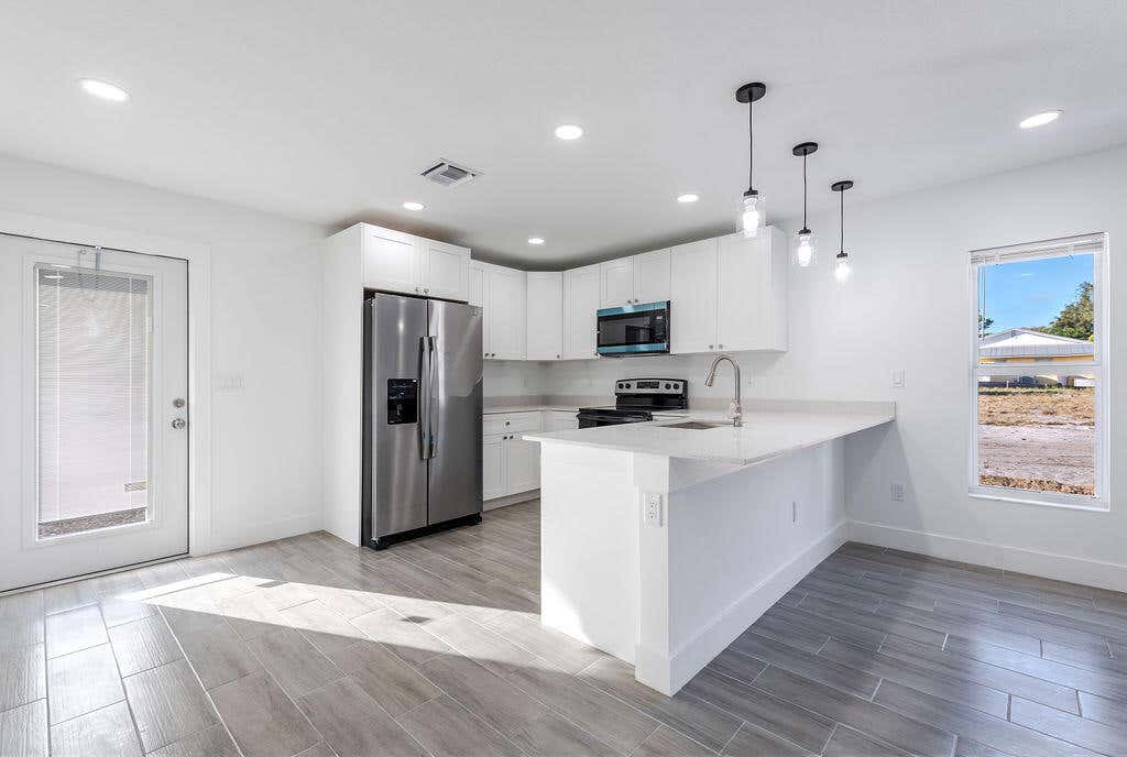 Photo of 3018 SE Iris Street #1, Stuart, FL 34997 (MLS # B26048155)