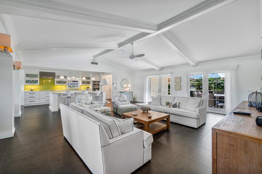 Luxury setting. Worthy of your style! Renovated 3 bedroom 2 bath Contempo with lush lake and golf views. A kitchen to please even the most discerning  chefs, white cabinetry, white/gray quartz counter top accented with light green tile back splash. Pendant lighting. Stainless appliances by Jennair and Fisher Paykel. Center island work station with sink and breakfast bar.Oversized dark gray tile flows throughout entire home. Living area with beamed ceiling, dual glass entry doors. Master bedroom features customized walk-in closet, bath with white cabinetry, walk-in shower and water closet. Large guest bath with gray cabinetry, white counters and walk-in shower. Custom sunshades on sliders, doors and windows. Central vac and impact glass. Exceptional quality. Understated elegance. Furnished. Mandatory membership.  Quail Ridge is a private, member-owned community and club. All residents are members of The Club at Quail Ridge and have a choice of Full, Intermediate or Primary Membership.