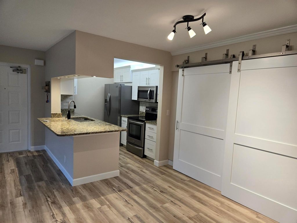 Photo of 2516 SE Anchorage Cove SE #B-2, Port St Lucie, FL 34952 (MLS # R11007695)