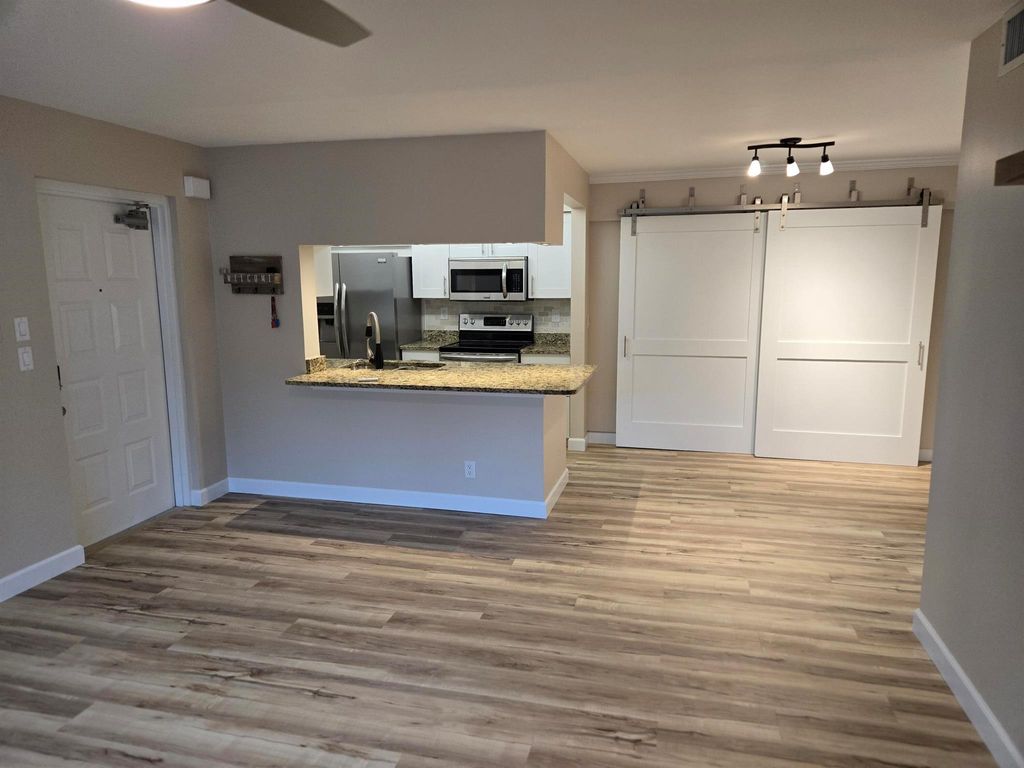 Photo of 2516 SE Anchorage Cove SE #B-2, Port Saint Lucie, FL 34952 (MLS # R11007695)