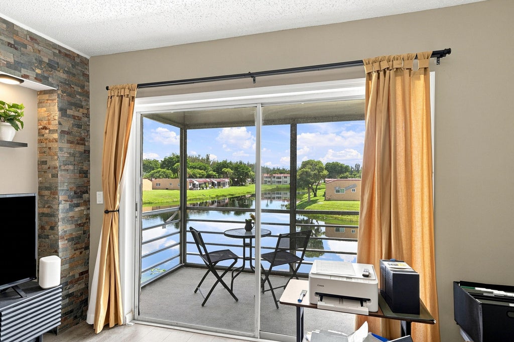 Photo of 198 Lake Frances Drive, West Palm Beach, FL 33411 (MLS # B26072489)