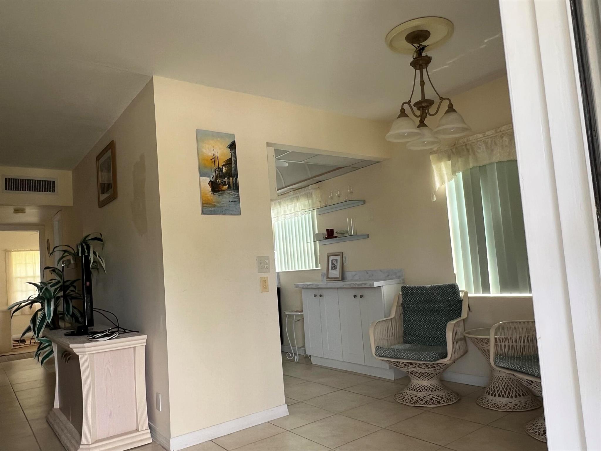 55 AND OVER COMMUNITY. Second floor end unit with central air-conditioning. Being offered partially or unfurnished. Ready for move in.