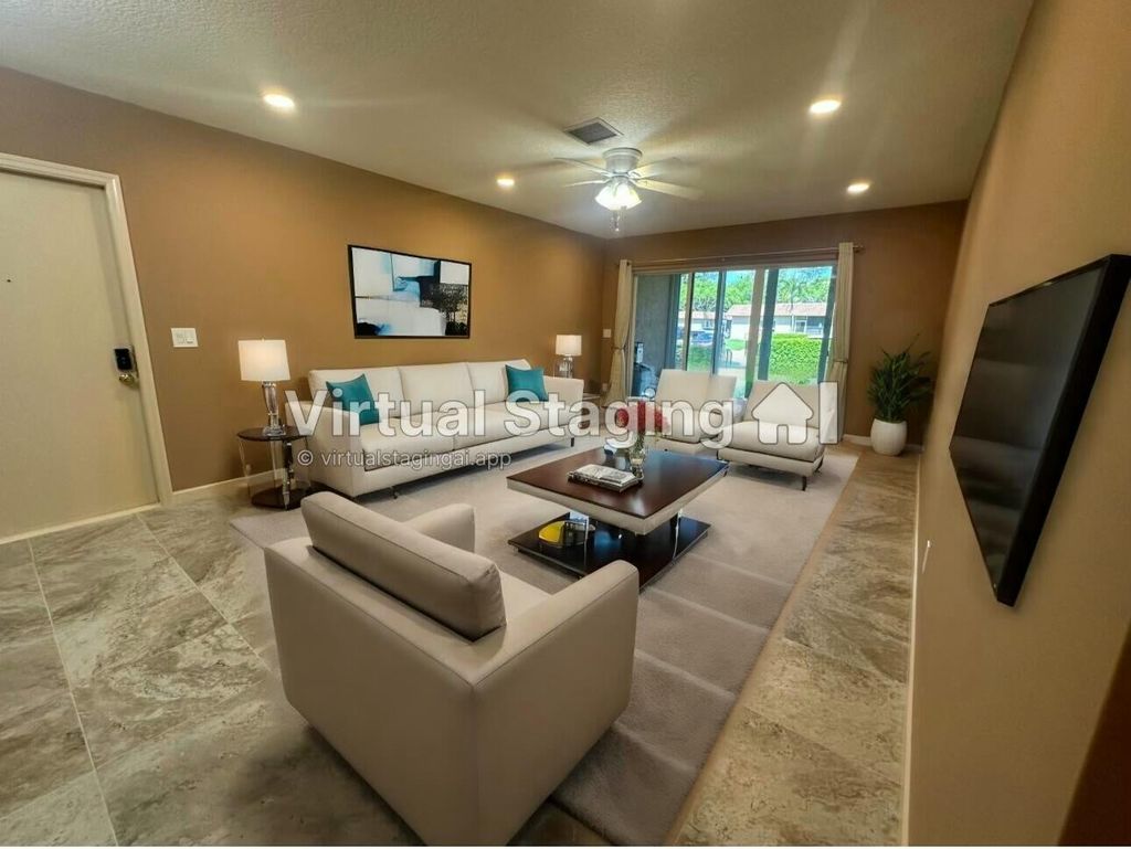 Photo of 1900 Palmland Drive #A, Boynton Beach, FL 33436 (MLS # R11046686)