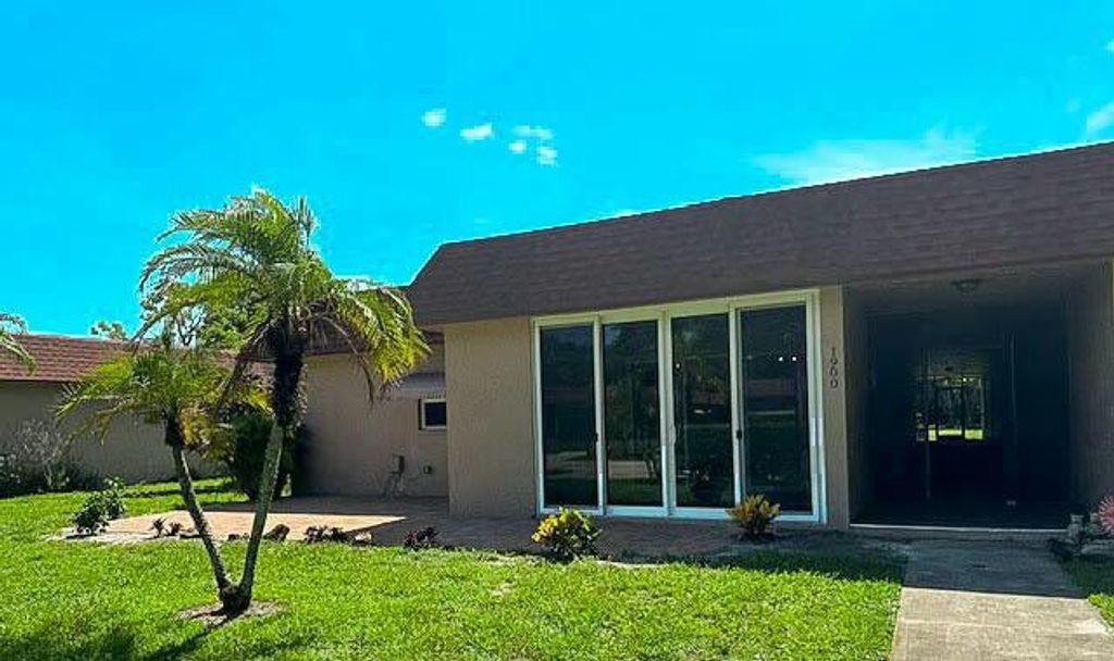 Photo of 1900 Palmland Drive #A, Boynton Beach, FL 33436 (MLS # R11046686)