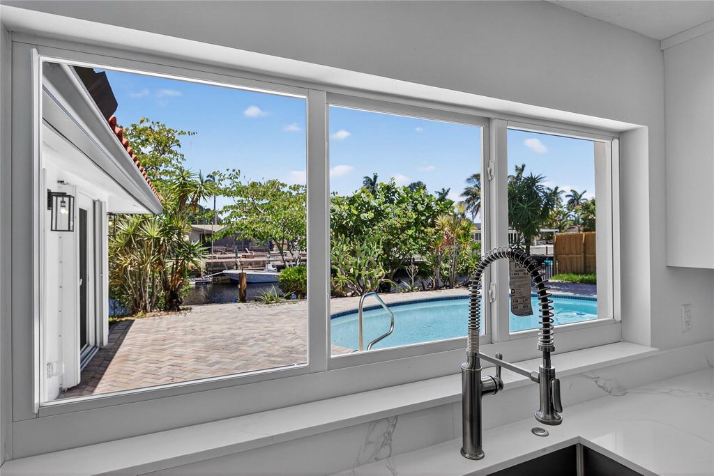 Photo of 1461 NE 57th Ct, Fort Lauderdale, FL 33334 (MLS # F10521023)