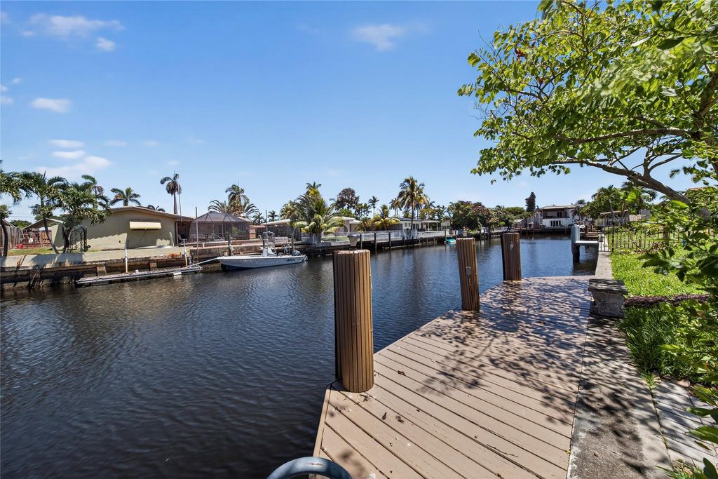 Photo of 1461 NE 57th Ct, Fort Lauderdale, FL 33334 (MLS # F10521023)