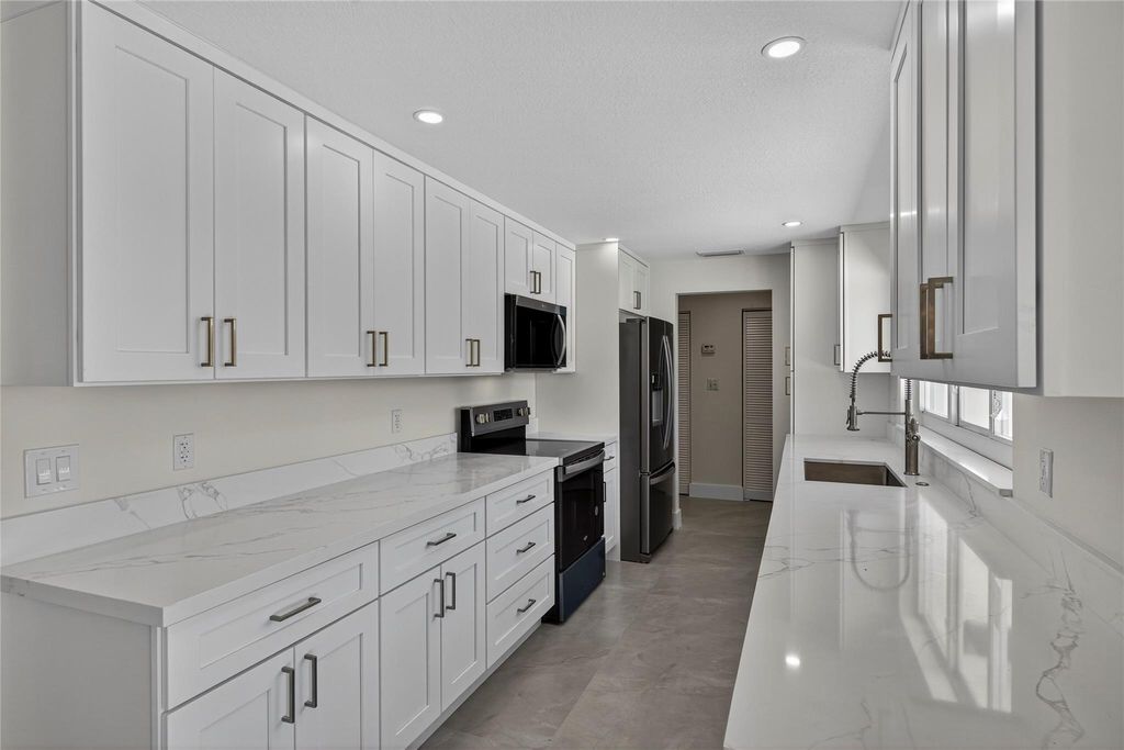 Photo of 1461 NE 57th Ct, Fort Lauderdale, FL 33334 (MLS # F10521023)